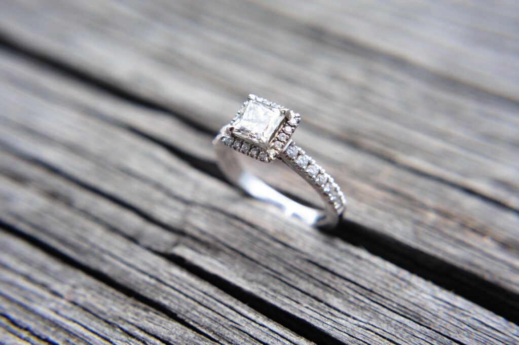 A Diamond Engagement Ring in a piece of wood